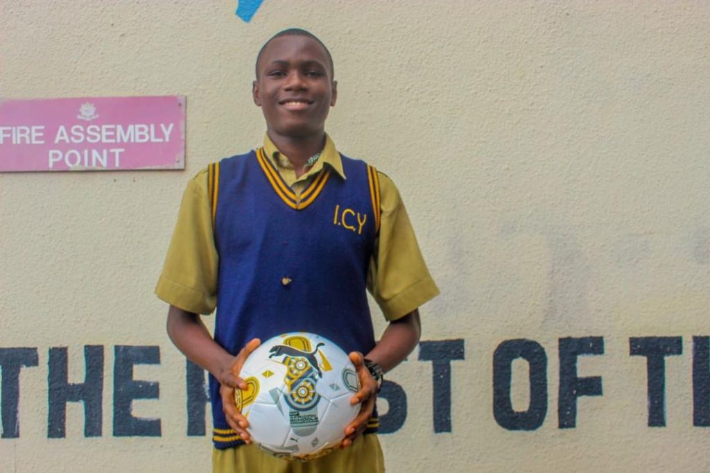 CAF footballs presented to Igbobi College students in Lagos under the CAF School Football Development Initiative.