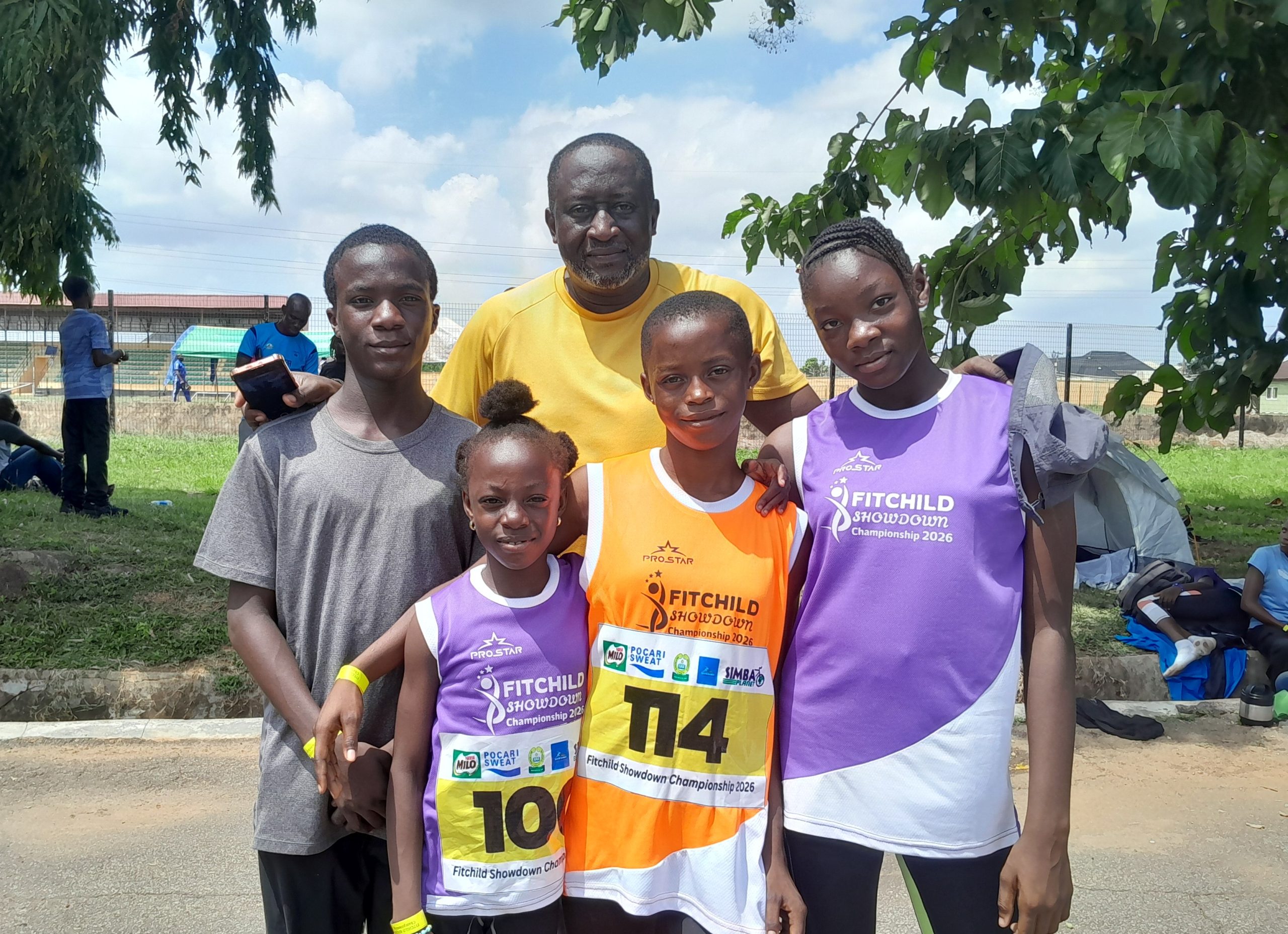 Coach Femi Daramola with his Altivelis Track Club athletes