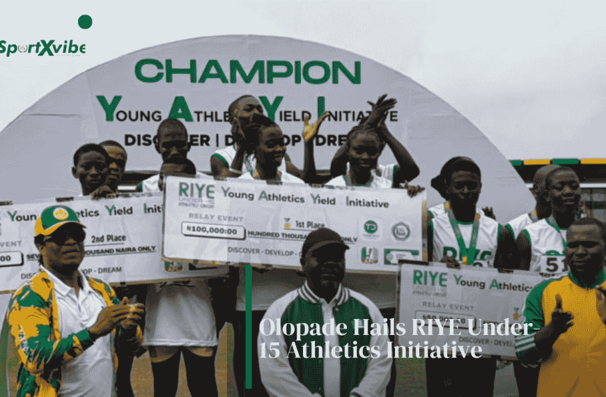 NSC Director-General Bukola Olopade with young athletes during the grand finale of the RIYE Under-15 Athletics Circuit at the MKO Abiola Sports Arena, Abeokuta.